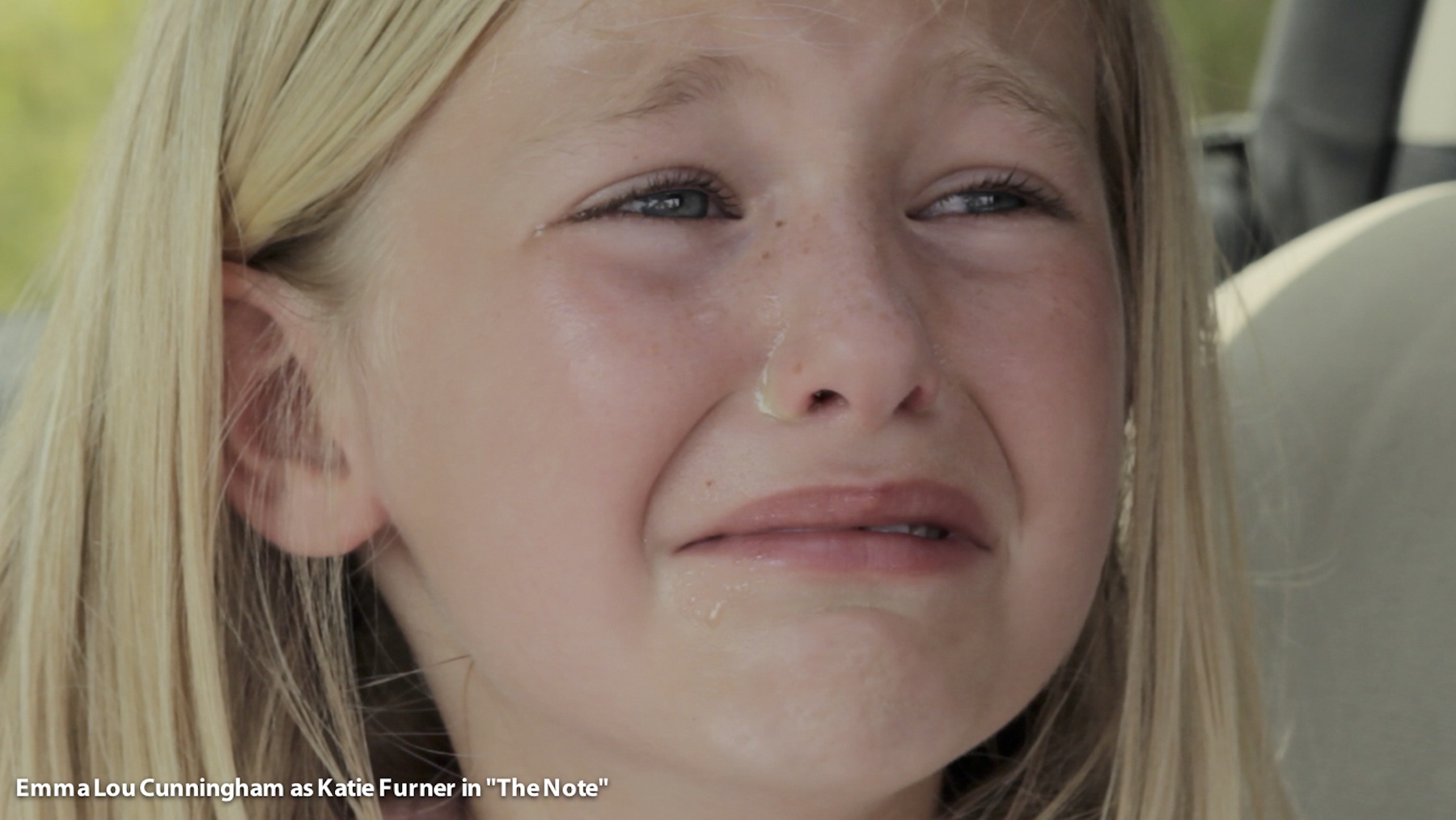 Screenshot from Emma's emotional scene as Katie Furner in The Note.
