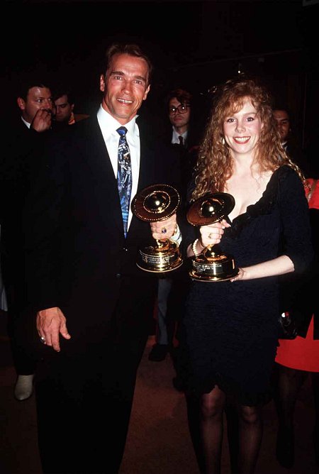 With ARNOLD SCHWARZENEGGER at Saturn Awards, Vivian accepting Best Picture for 