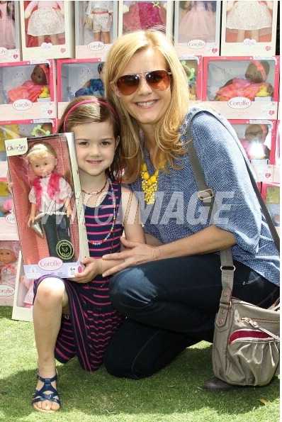 LOS ANGELES, CA - MAY 18: Christie Lynn Smith (R) and daughter, Abby Ryder Fortson attend the Corolle Adopt a Doll Event at The Grove in Los Angeles, California.