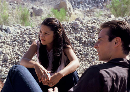 Still of Paula Garcés and Ryan Merriman in Spin (2003)