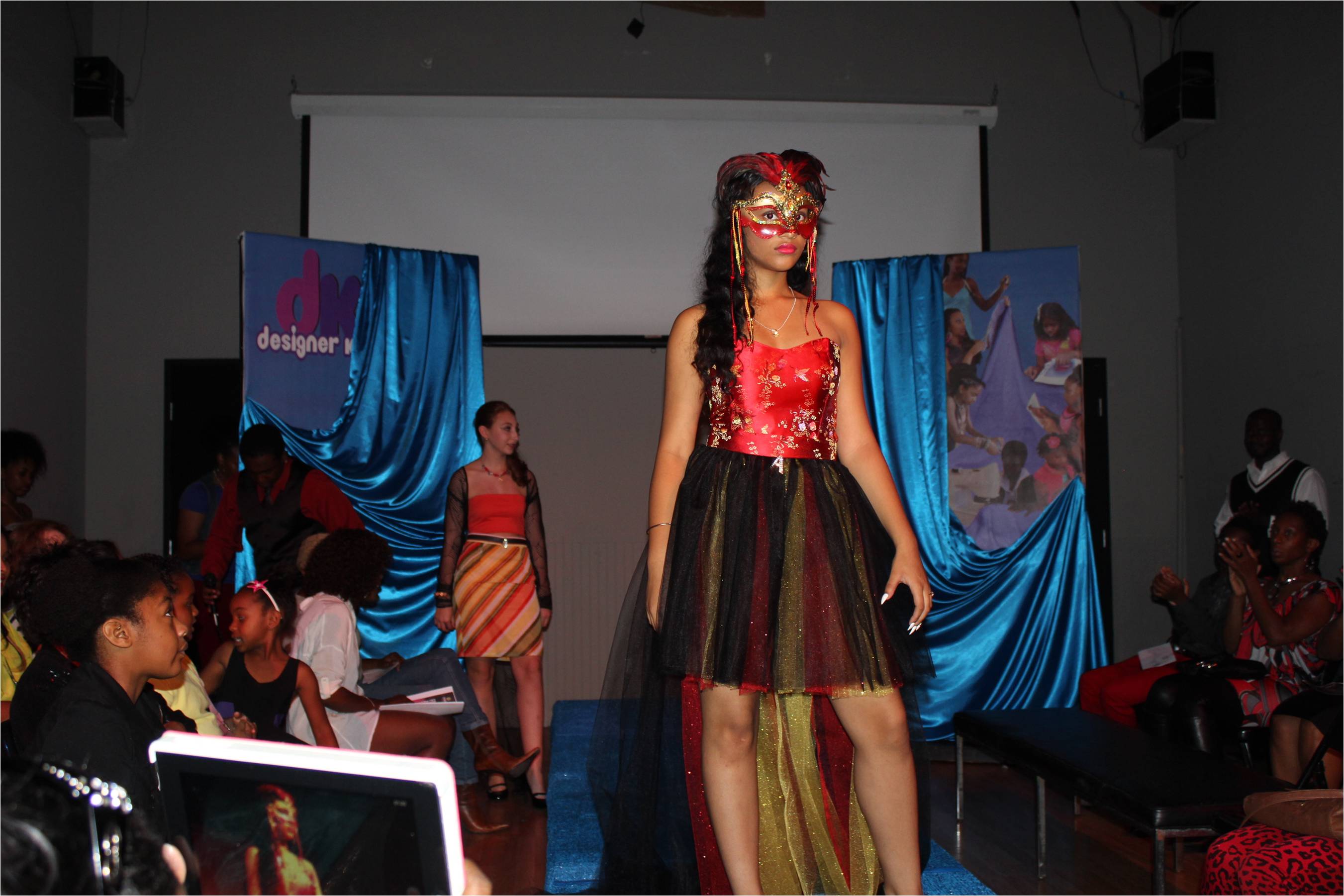 Aliyah Royale hits the runway for Designer Kids in a gown she designed and sewed.