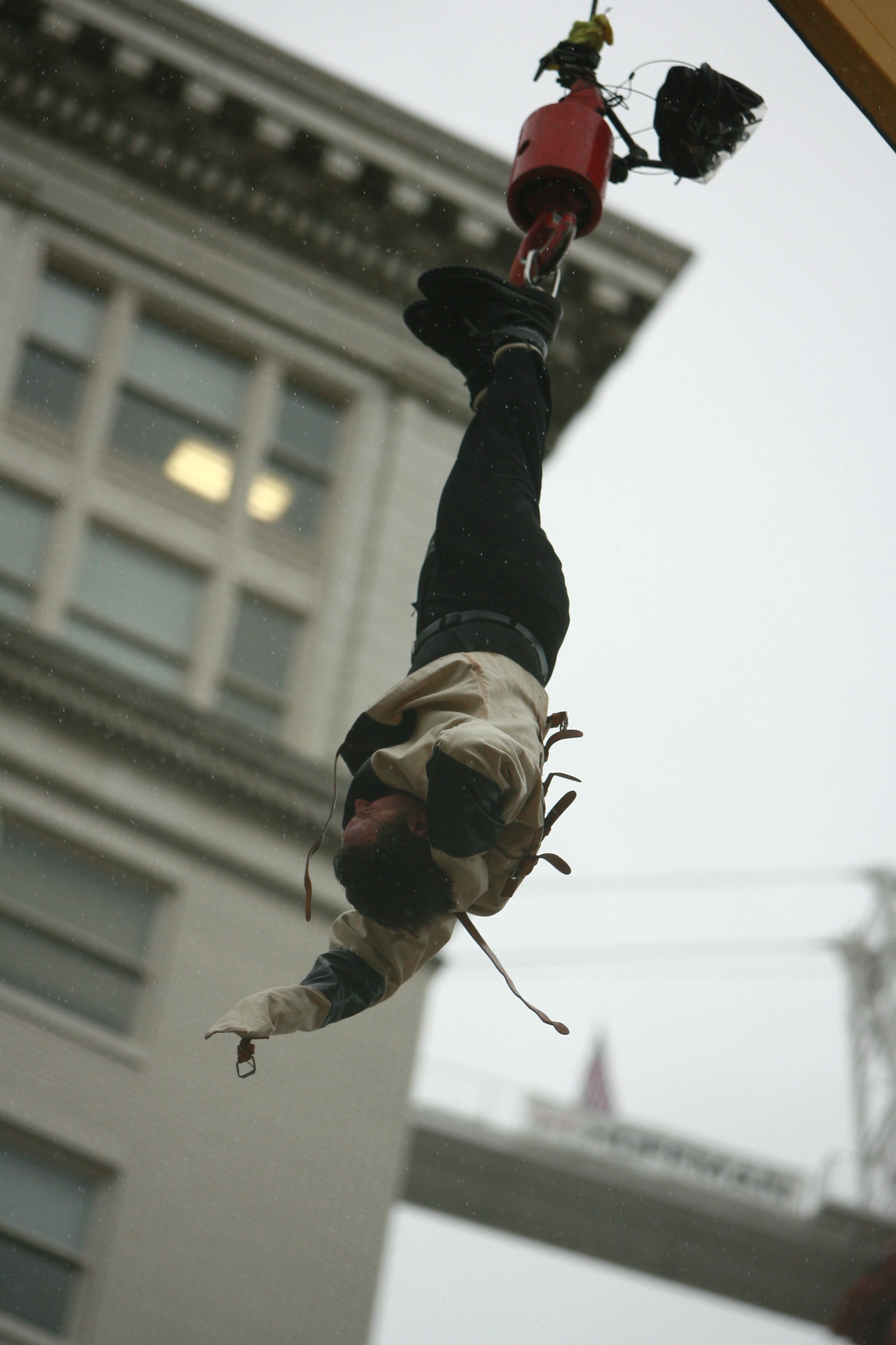 Escaping a straitjacket 150 feet above the street in Portland Oregon for a corporate promotion.