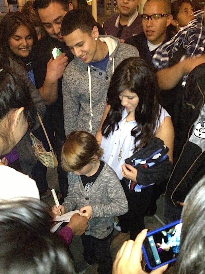 Aiden signing autographs at the LA premiere of Paranormal Activity 4.