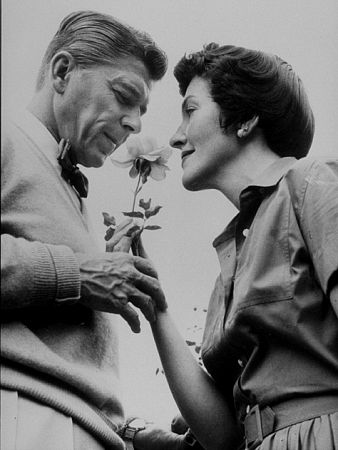 Ronald Reagan with wife Nancy at home C. 1955