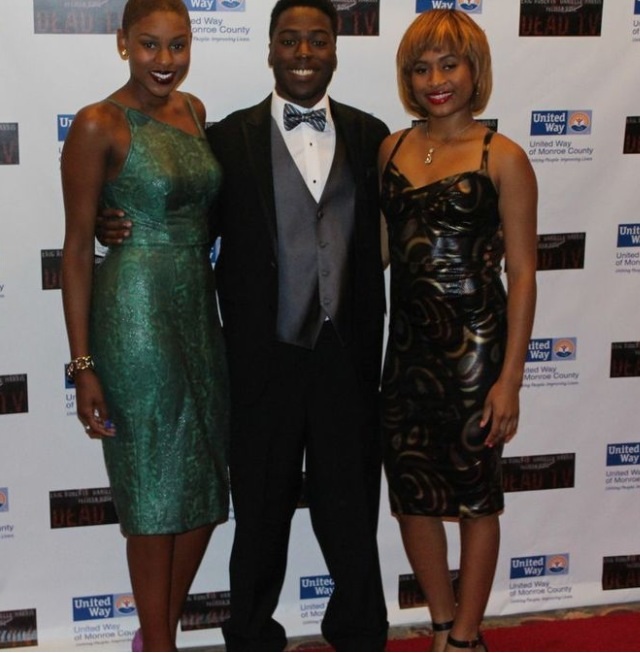 Angel on the red carpet with his stylist's Naya Taylor and Paige Jeter