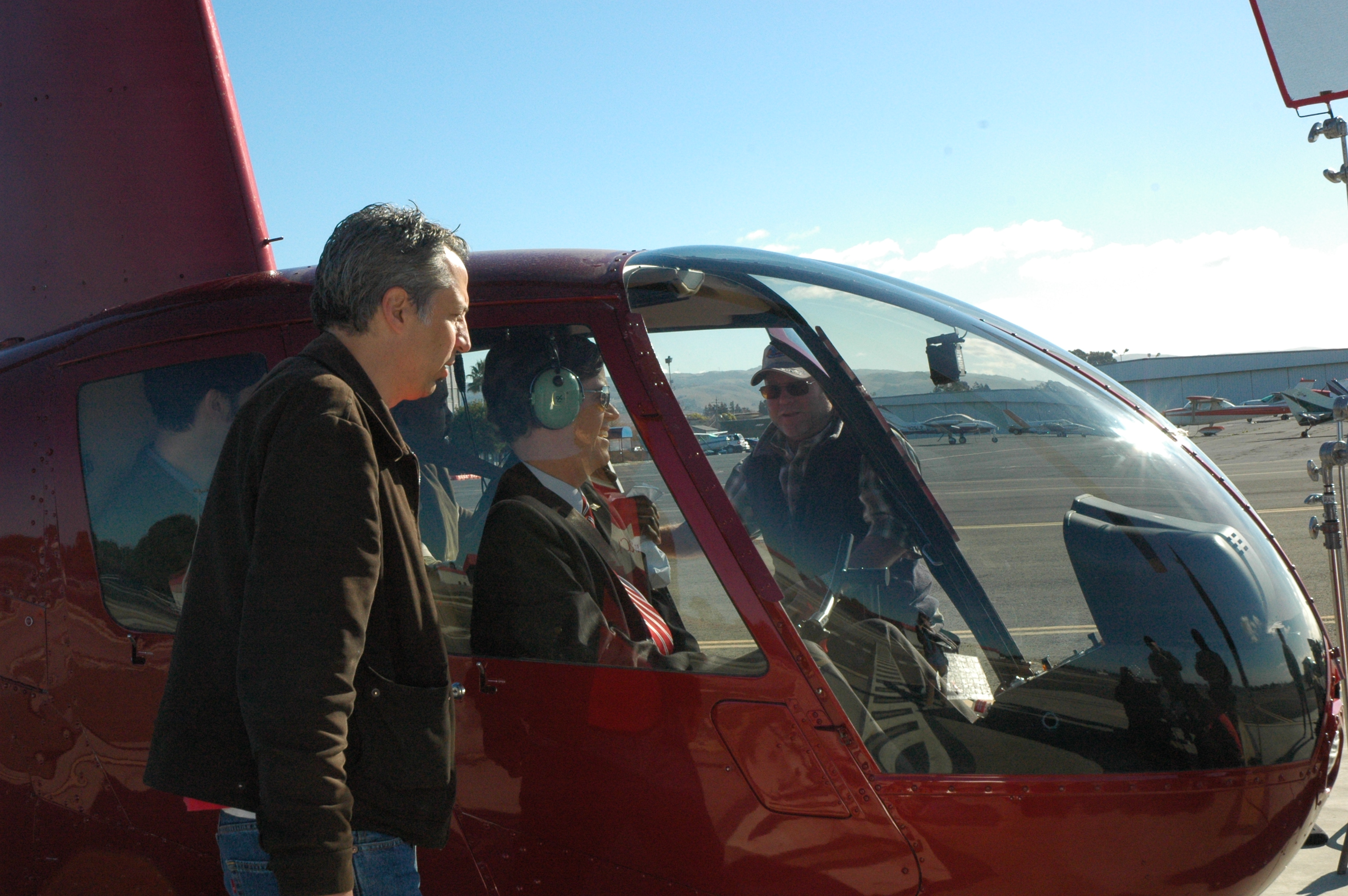 Patrick Gilles, Mike Maley and Dylan Baker prep for aerial shot