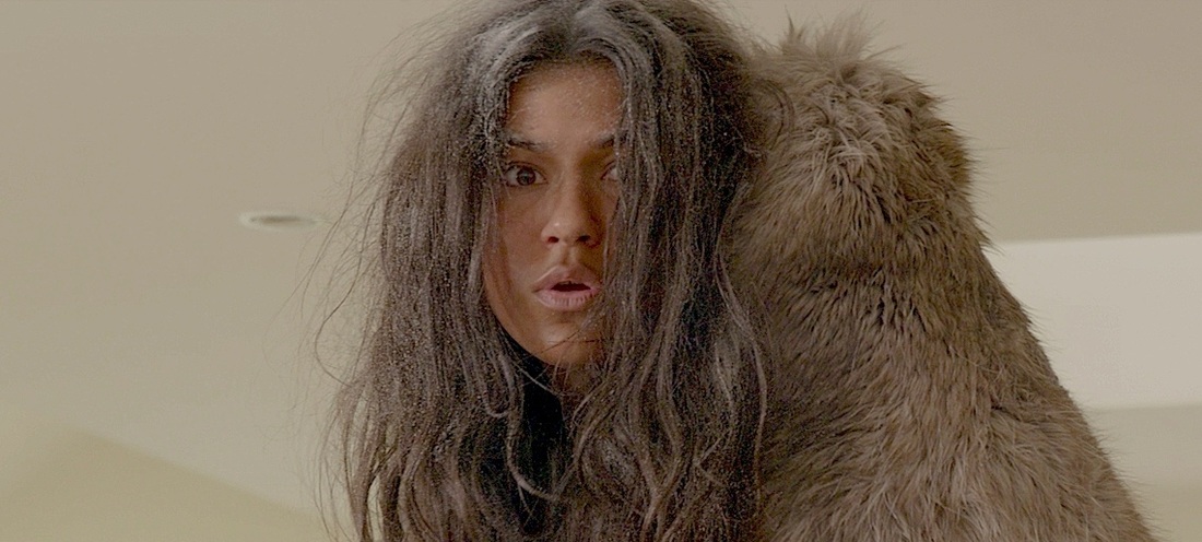 Ramanique as Cavewoman in Modern Man