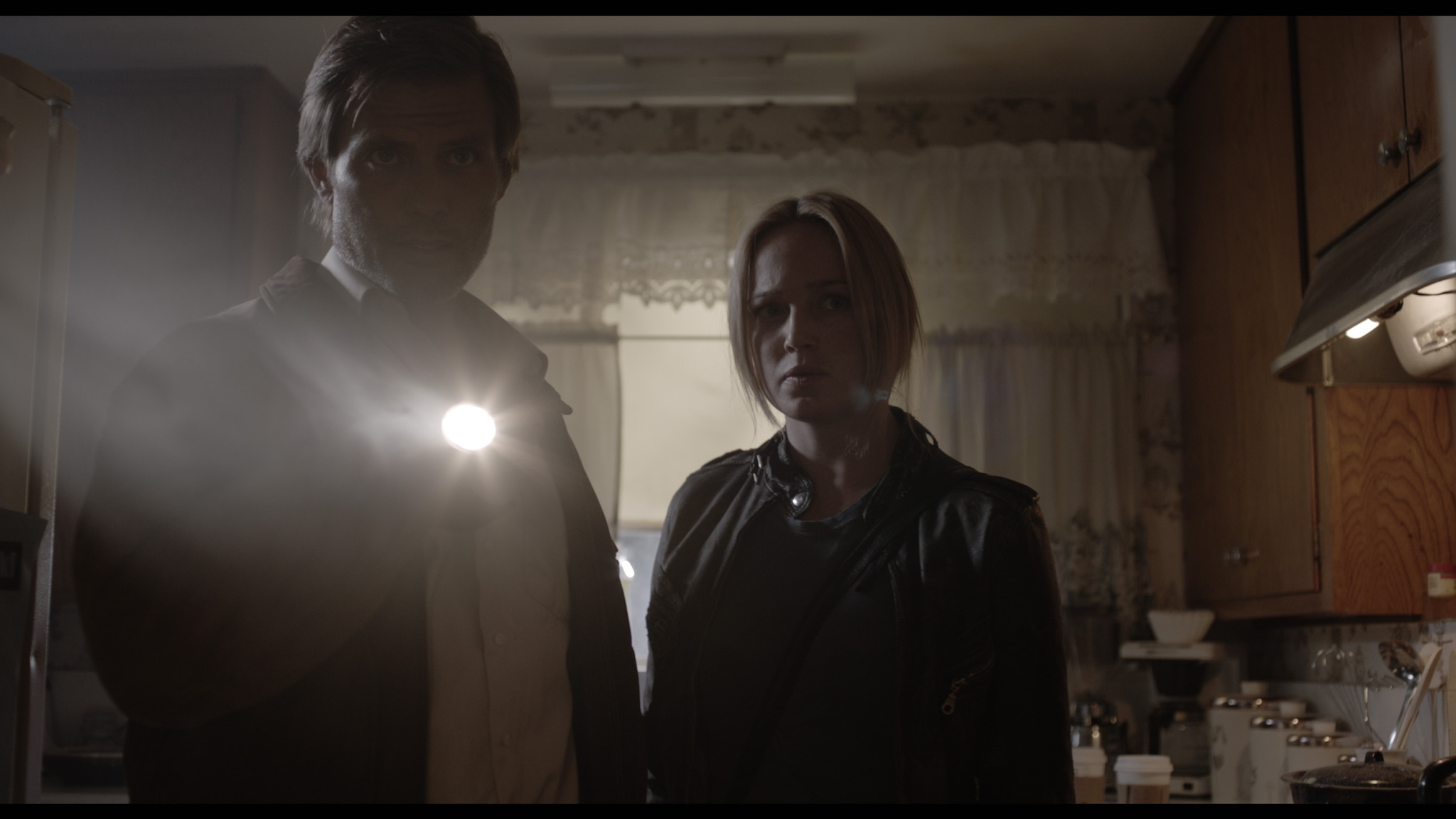 Still of Casper Van Dien and Caity Lotz in The Pact (2012)