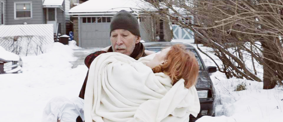 Paul (Harold Tarr) carrying Juliette (Susan Kirby) in the snow, during the filming of 'When?'. (2013)