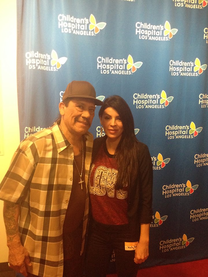 Danny Trejo and Brenda Pond volunteering at the childrens toy drive/blood donation event (2014)