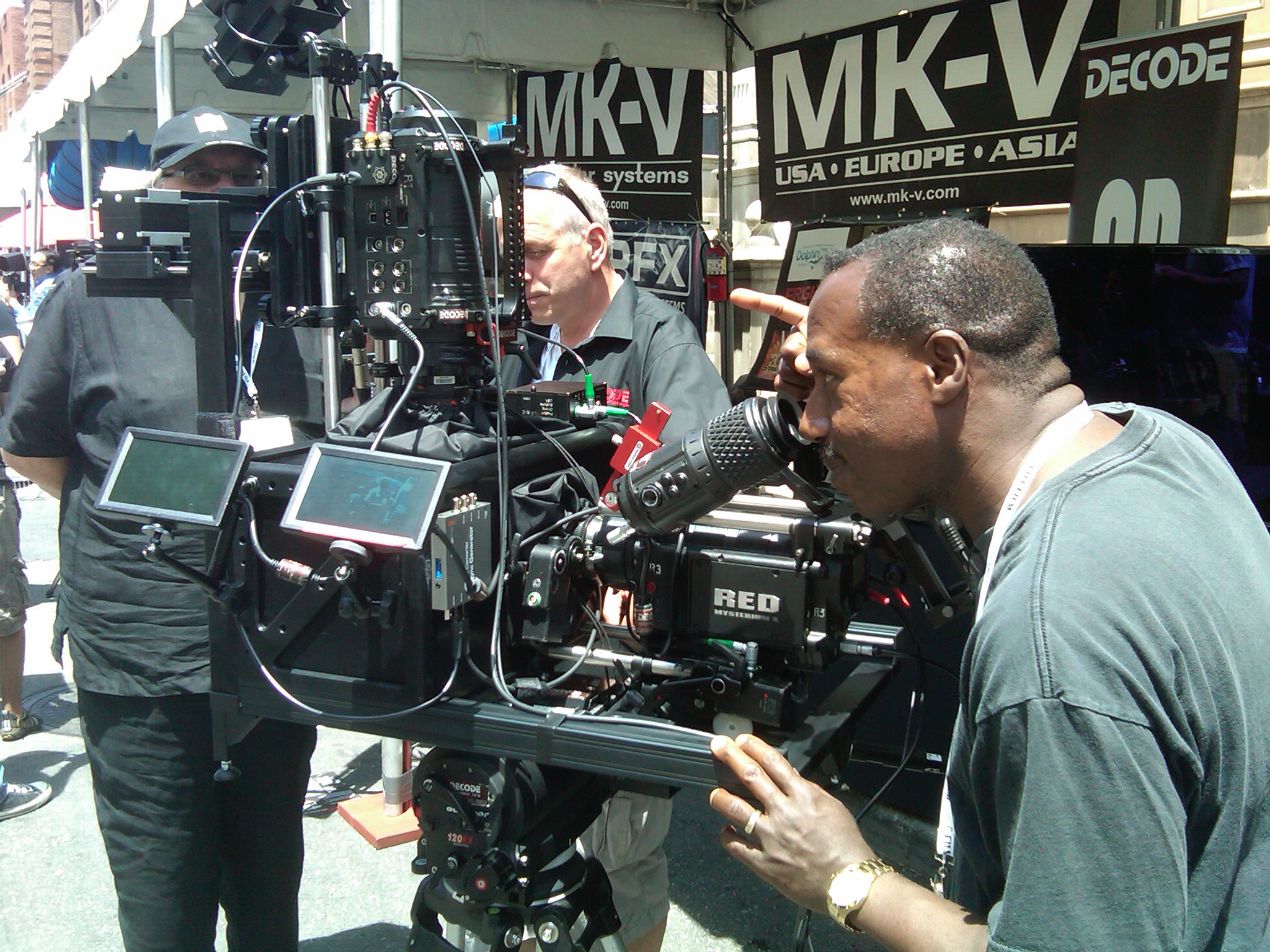 Director Bruce B. Gordon inspecting a 3D RED Camera rig: Cine Gear Expo at Paramount Pictures Studios.