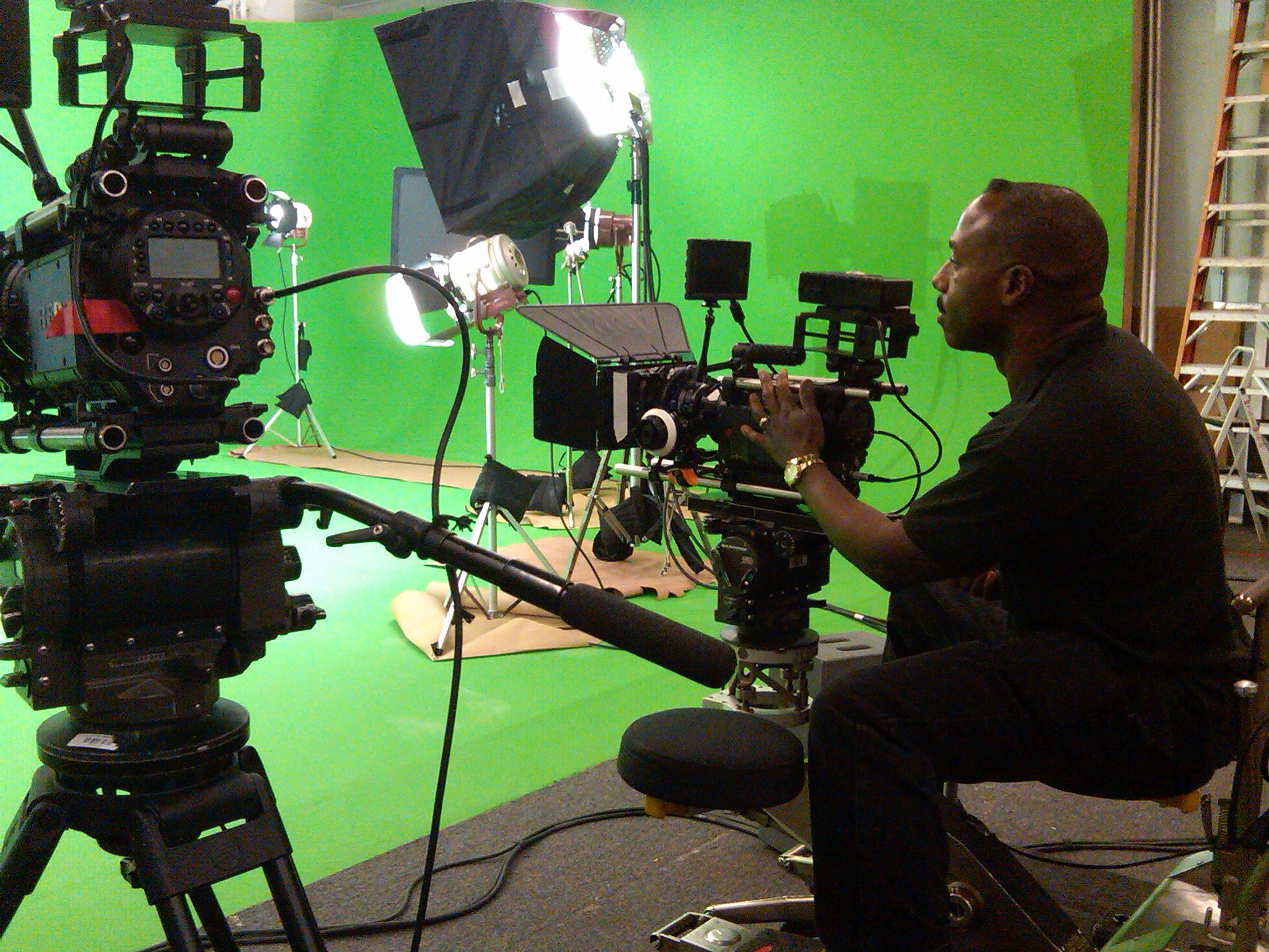 Director Bruce B. Gordon surveying RED camera set up for a green screen SFX shoot.