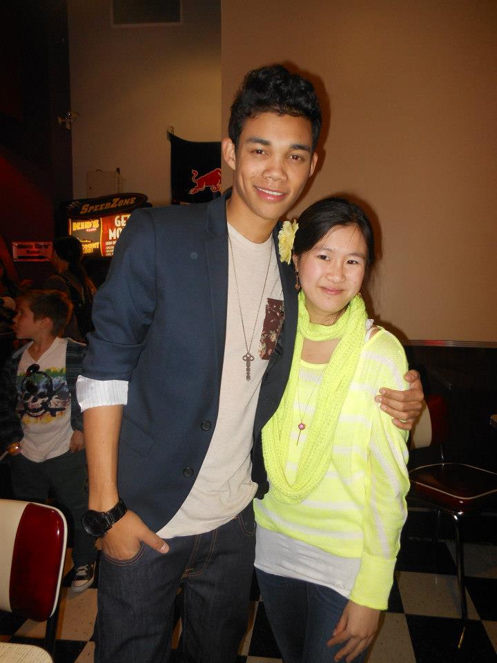 Actress Tina Q. Nguyen and actor Roshon Fegan attends the Johnny Rockets opening at Speedzone LA
