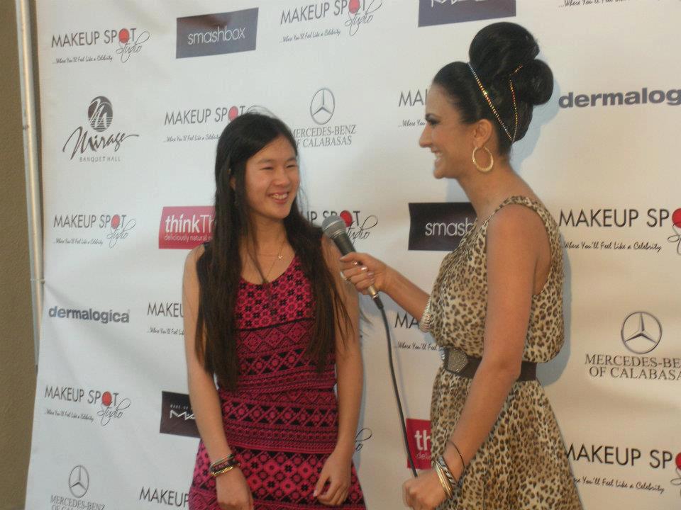 Actress Tina Q. Nguyen getting interviewed by Taguhi Tracy Oganyan at the Makeup Spot Studio Grand Opening in North Hollywood on July 5, 2012.