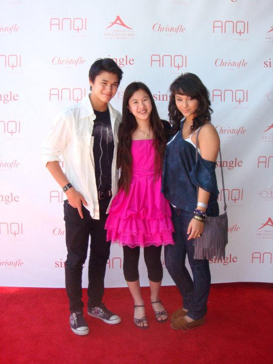 Tina Q Nguyen with actor/singer Booboo Stewart and actress/singer Fivel Stewart at an event for Mothers' Day at AnQi in South Coast Plaza.