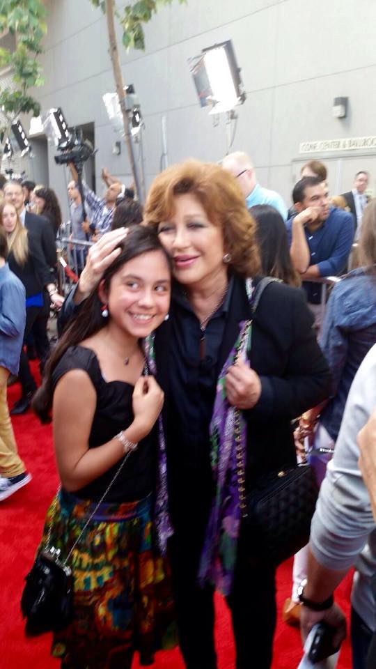 Genesis Ochoa with actress Angelica Maria at the Los Angeles premiere for The Book of Life.