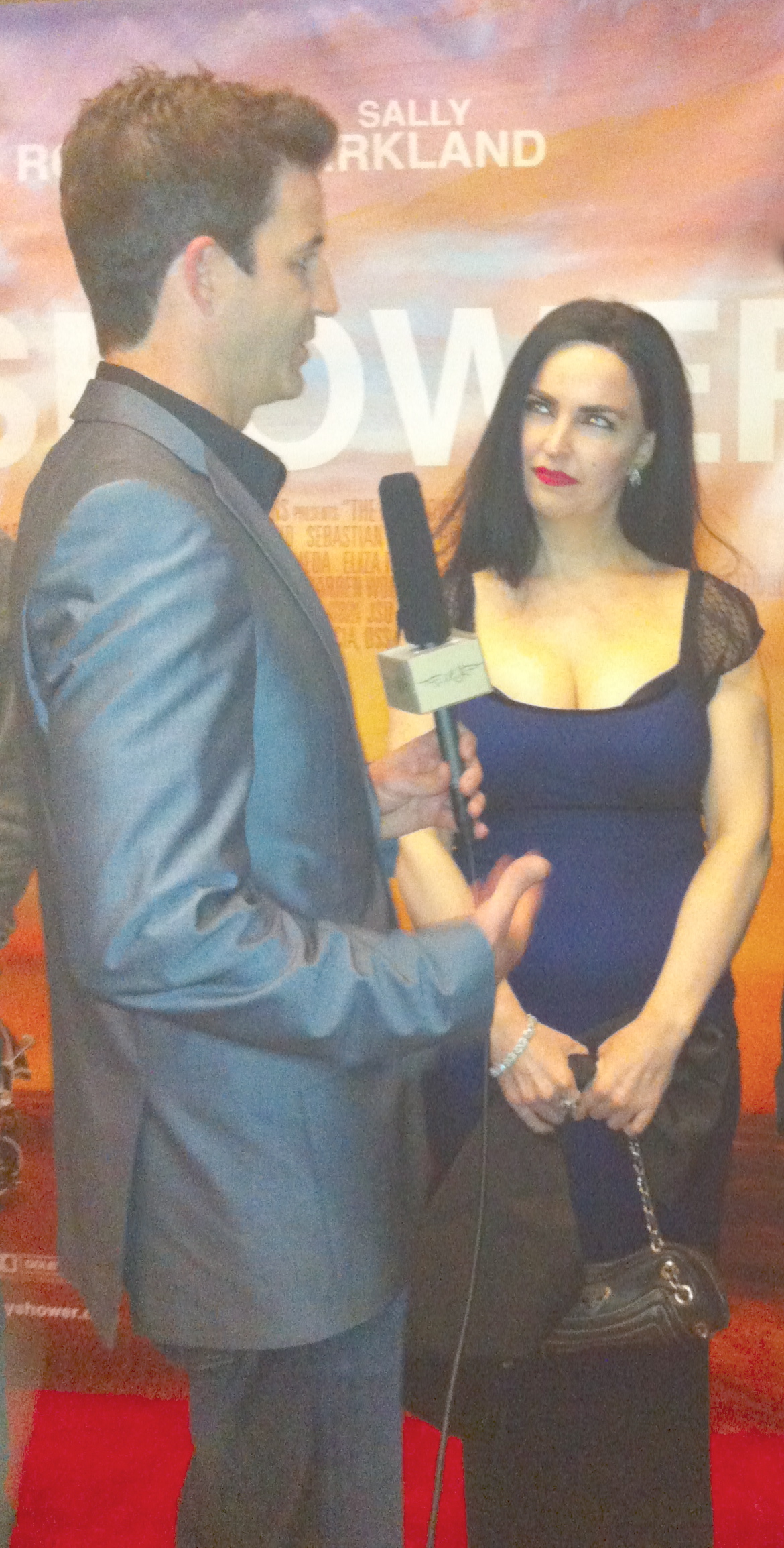 ACTRESS ALEXIS KILEY BEING INTERVIEWED ON THE RED CARPET FILM PREMIERE OF 