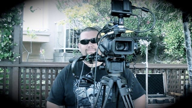 Me working the camera on set with Rob Walker in Hollywood Hillsl