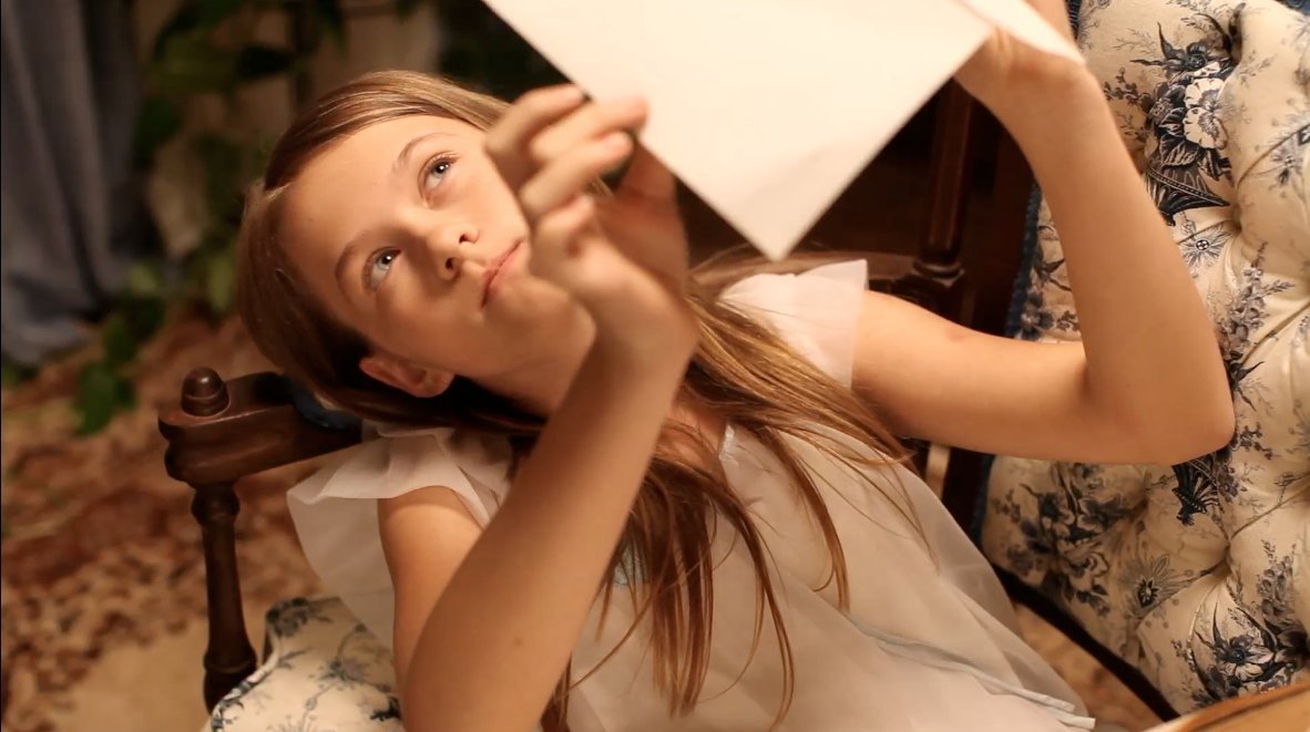 Trapped in her room, Lucy uses her imagination to escape to wonderful places.