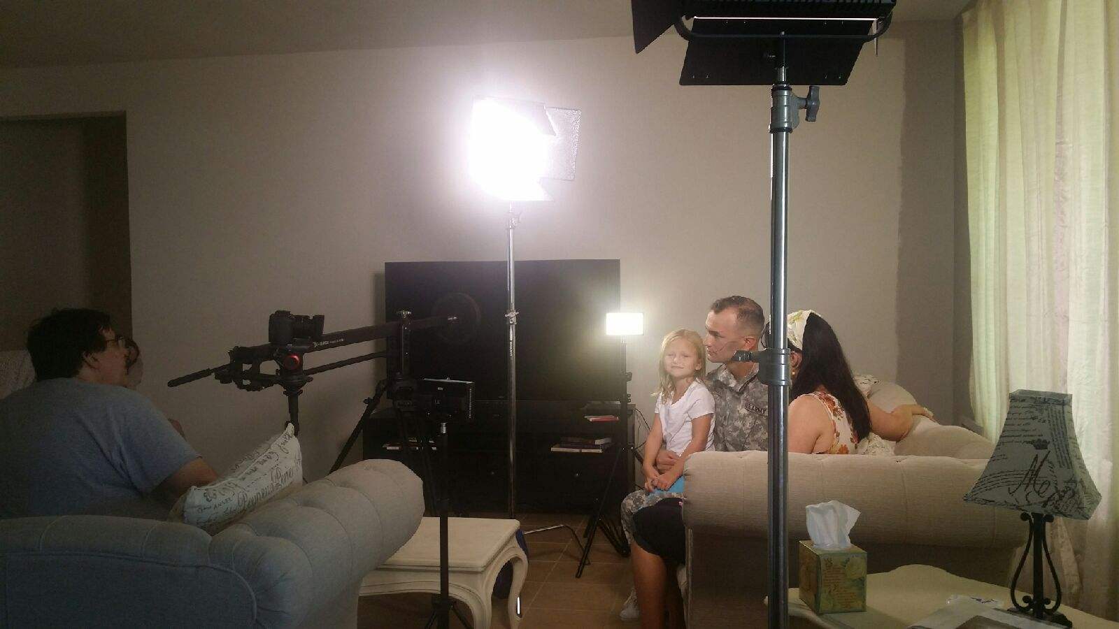 Director Michael D. Walters with Amberlyn Matthews, Josh Quijas and Melinda Quijas setting up a scene for Kiss Away My Ghosts