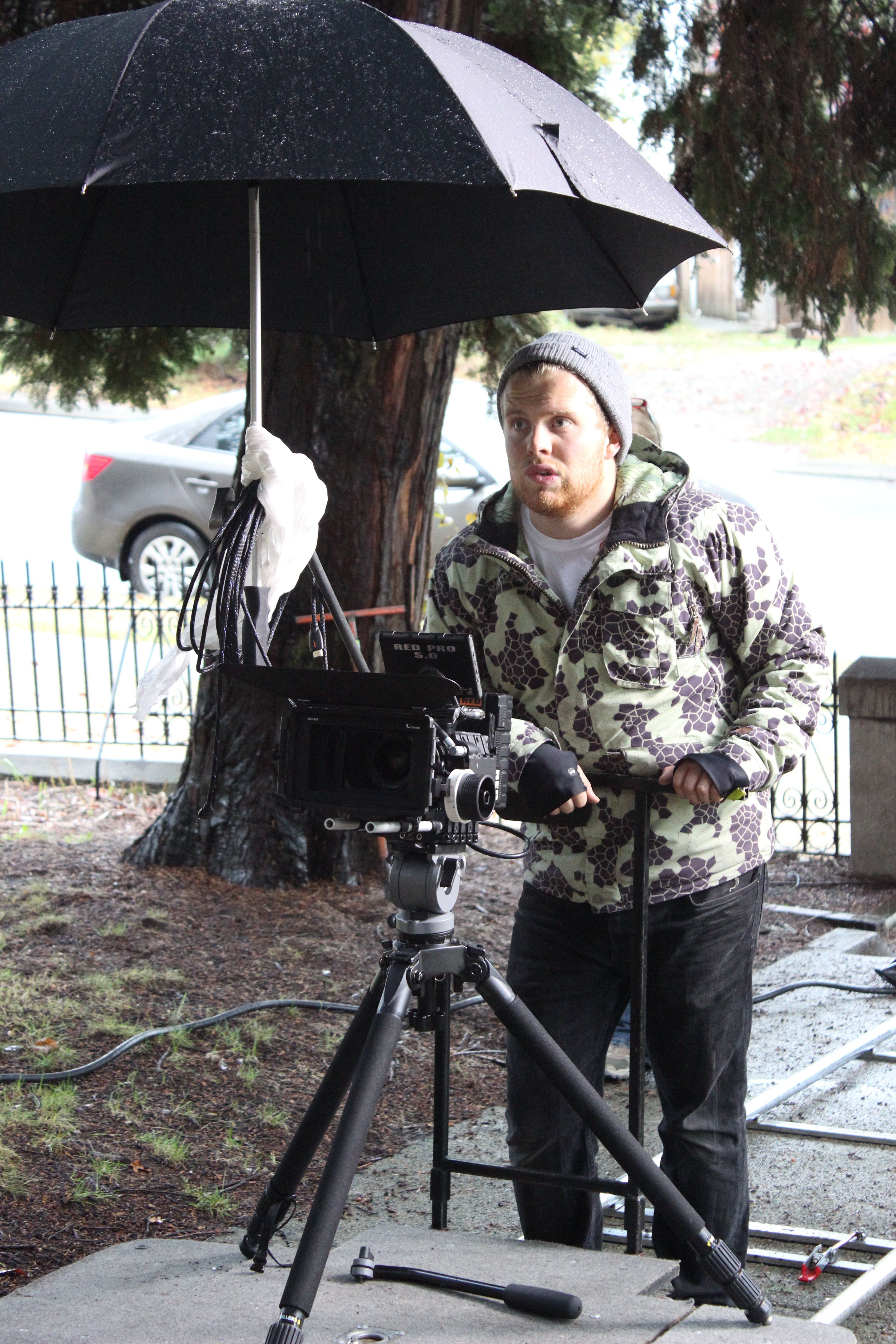 DOP, Jon Thomas, sets up a dolly shot outside the convent.