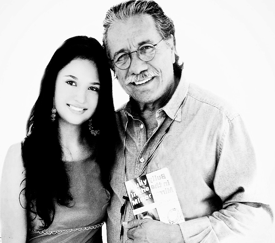 Edward James Olmos/with Shanaya; holding Shanayas fourth published book. 2013.