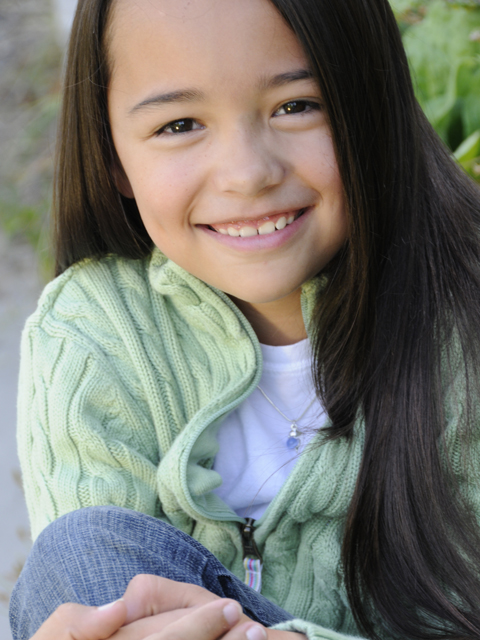 Aisha's first headshot -2009