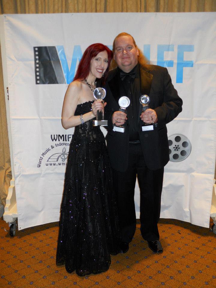 Shawn Anthony recieving his awards for best New Director and best Cinematographer for SoulMate True Evil Never Dies at the 2012 World Music and Independent film Festival Jessica Felice recieving an award for best actress for the same film