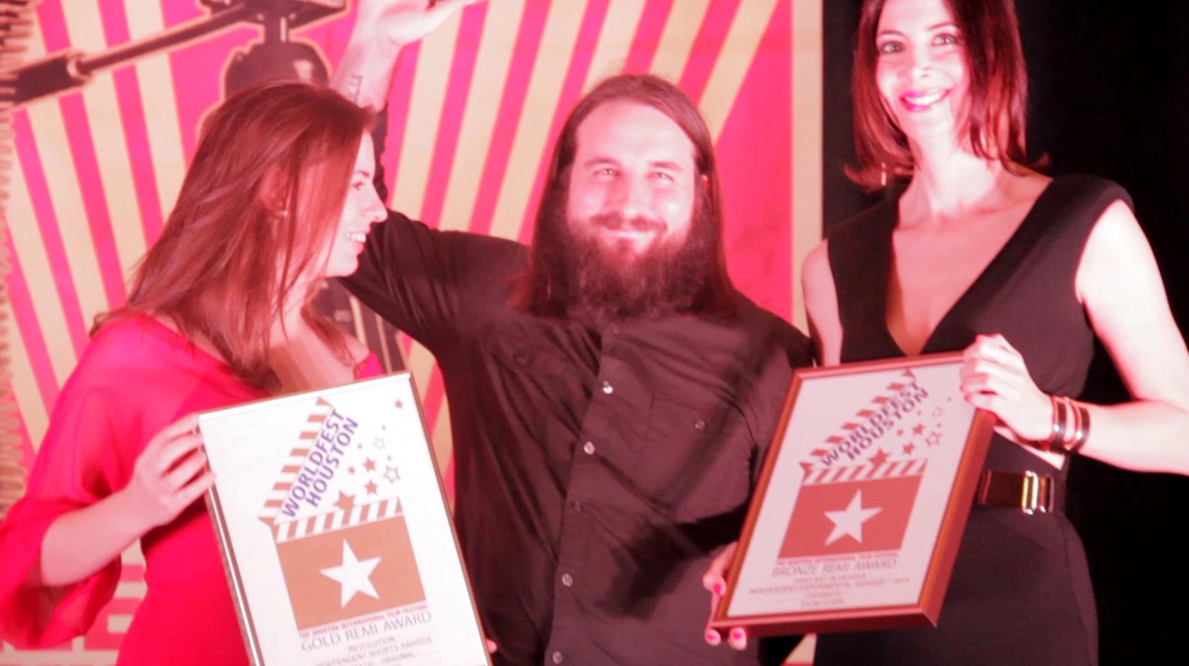 Thom Stark receives awards for two of his films, Revolution and Who Art in Heaven, at the 46th WorldFest-Houston.