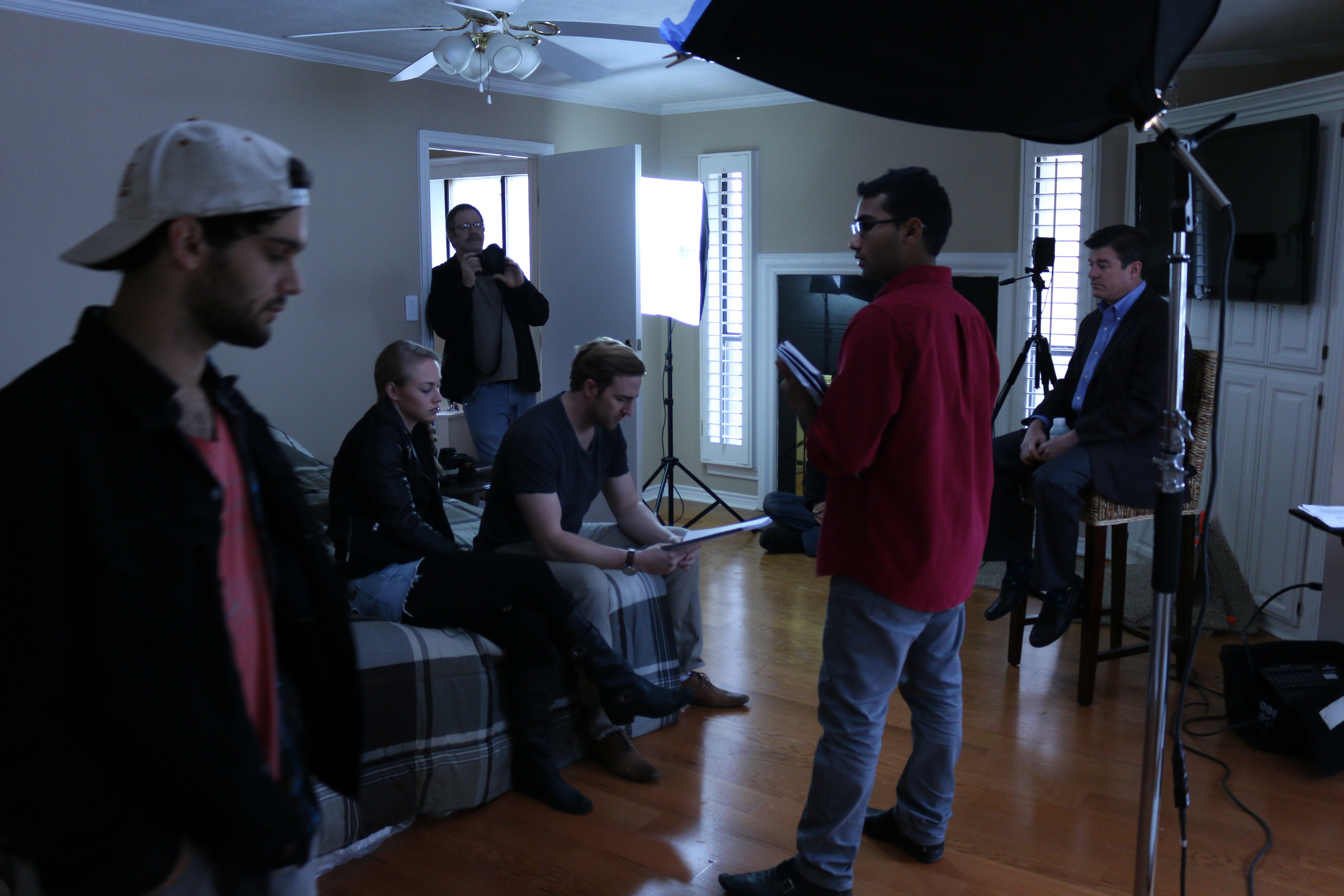 Kelsey Deanne and Chase Austin preparing a scene for Dead Story with Director Suneel Tripuraneni