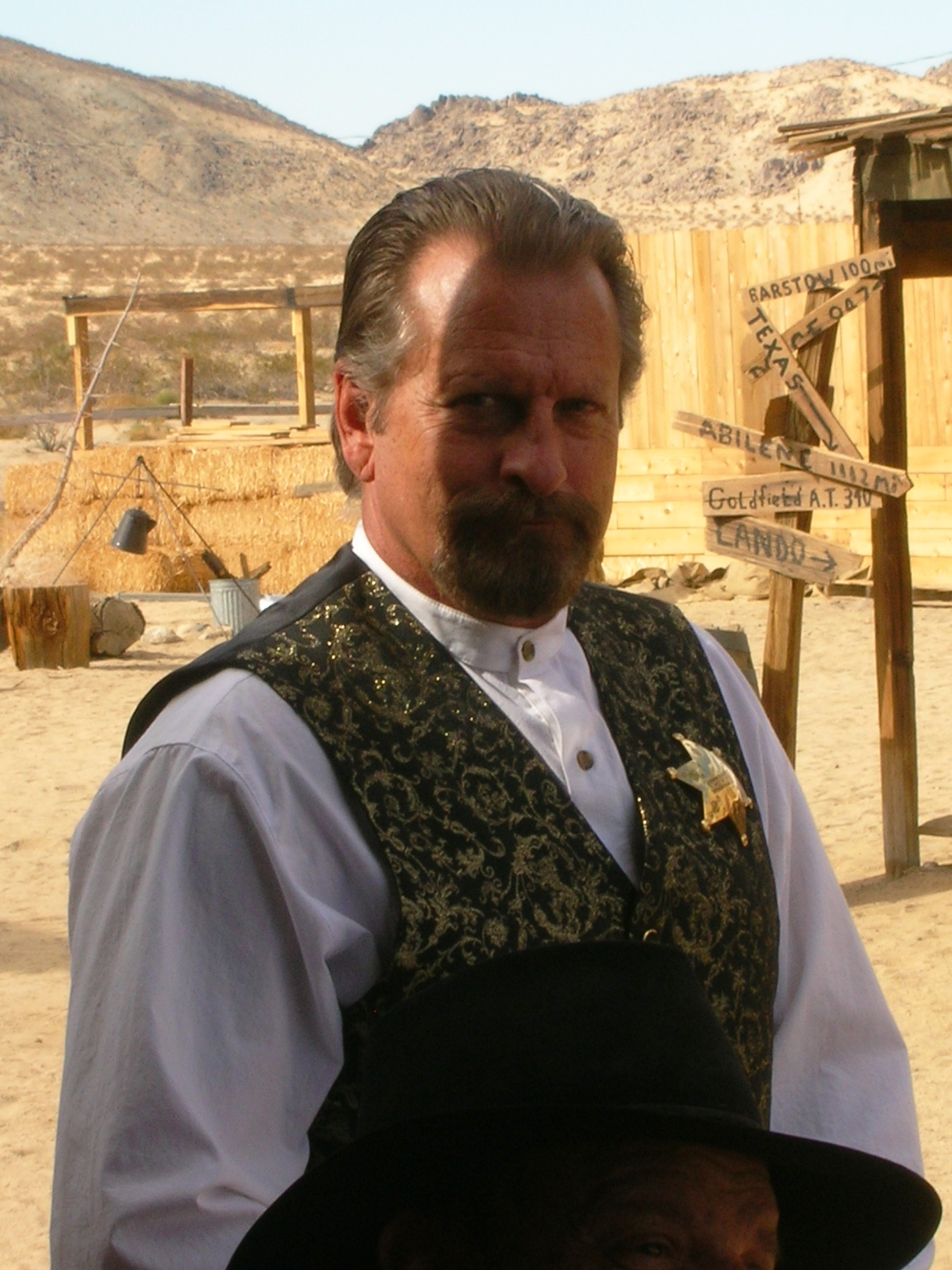 On location during the filming of Tales of the Frontier. Starring as, Sheriff Perry Doran
