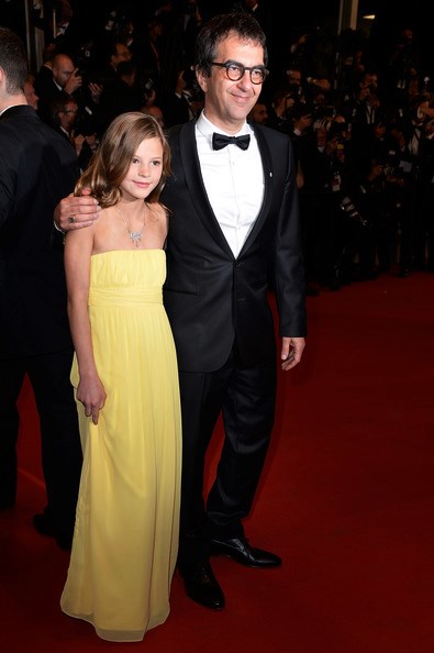 Actress Peyton Kennedy and Director Atom Egoyan on the Cannes Film Festival red carpet for the The Captive premiere on May 16, 2014