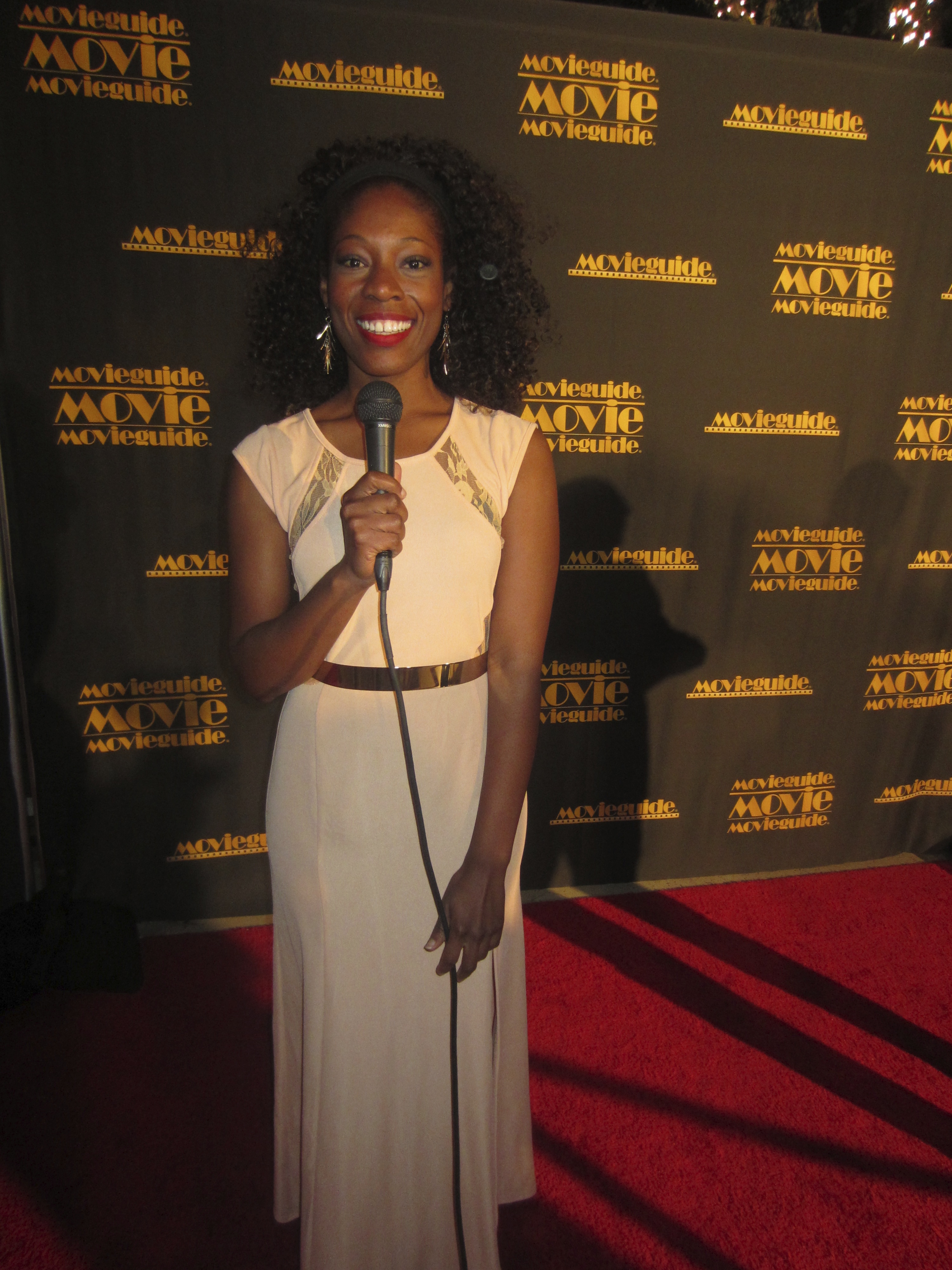 Host of Studio 3 Hollywood, Tysha live on the red carpet at the Movie Guide Awards