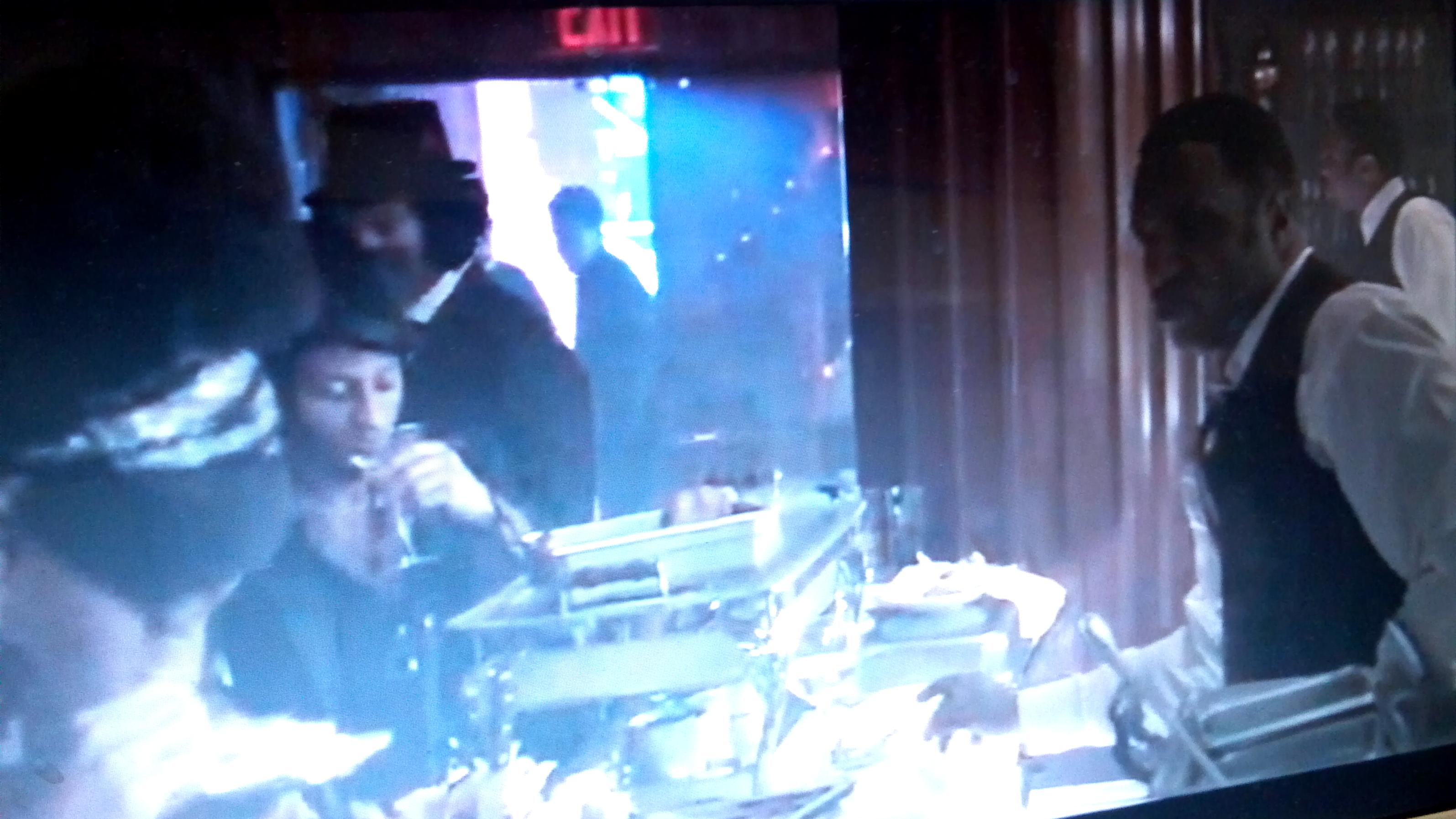 American Gangster (2007). Photo of Dj Nino Carta and Wise during bar scene.