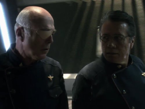 Still of Edward James Olmos and Michael Hogan in Battlestar Galactica (2004)