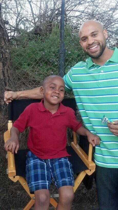 Brayden on set with his pretend Dad Lew.