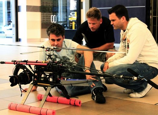 Aerial Cinematographer, Eric Austin (center) on the set of Batelco's award-winning 