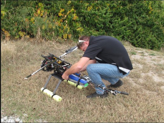 Pilot Eric Austin of Heli Video preps the remote-control drone chopper for a 