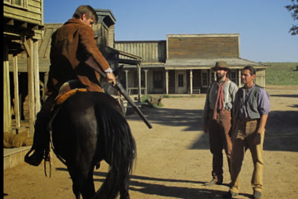 Stafford as legendary outlaw Billy the Kid on the set of 