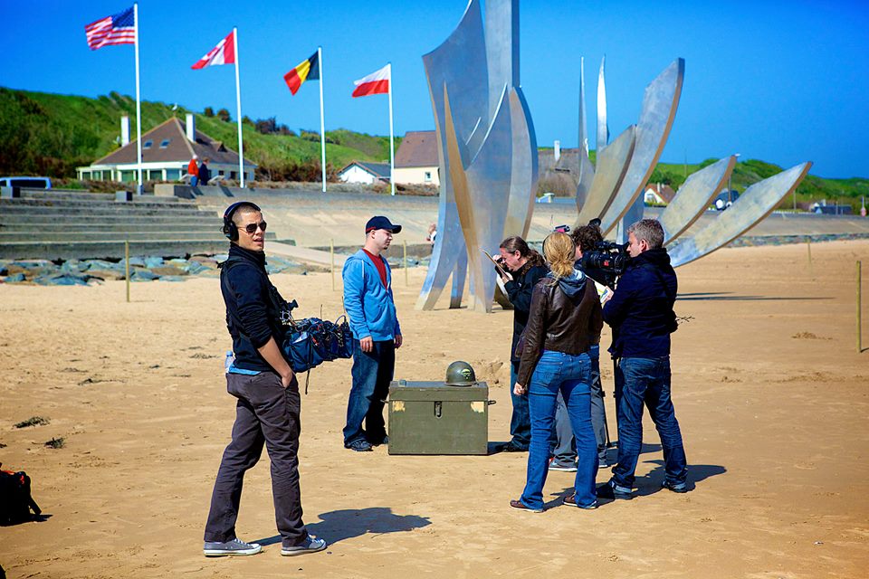Omaha Beach Monument with Erik Dorr. Producer A & B cam, Chris Ward Audio, and Tia Devlin Producer.