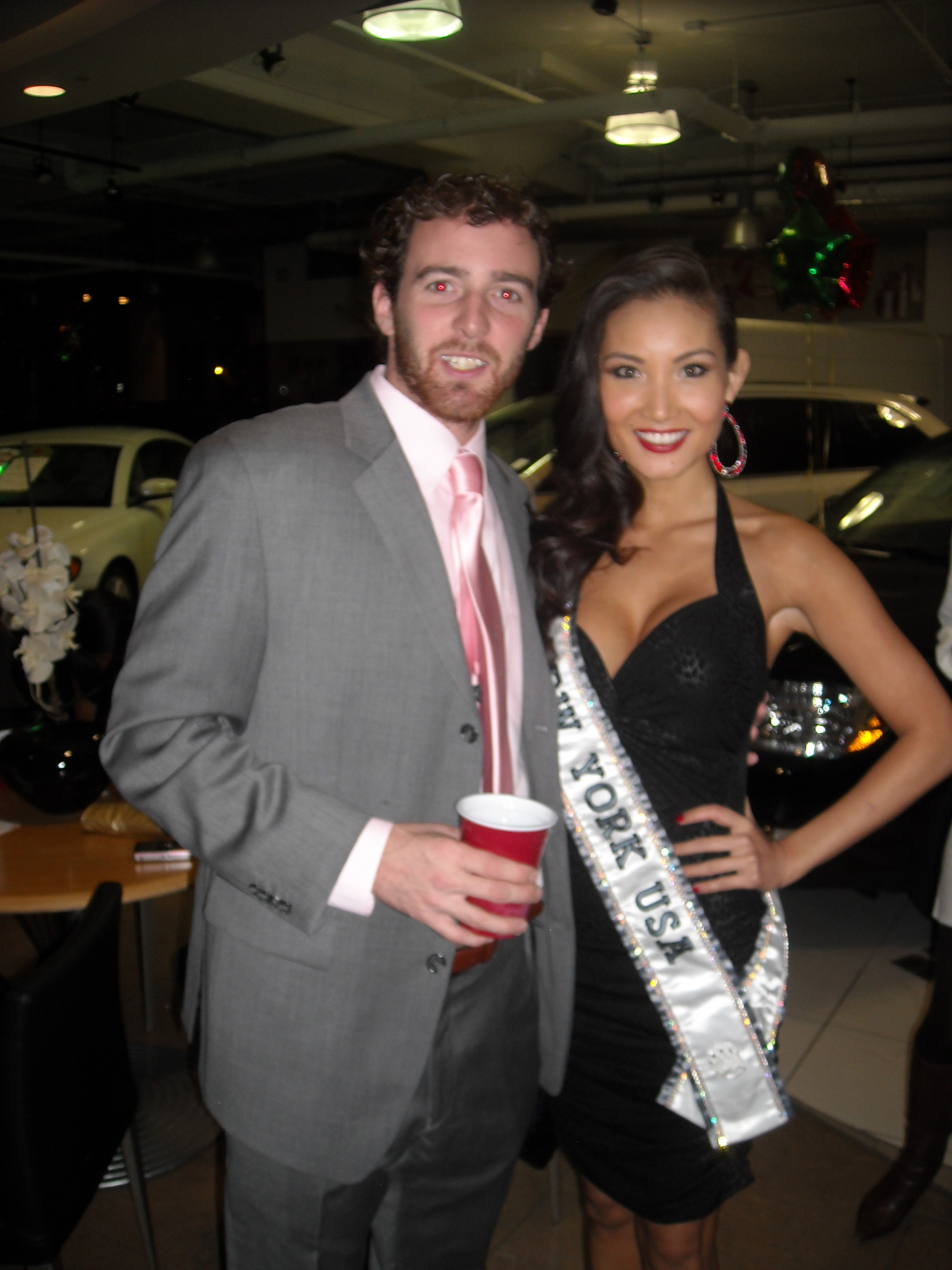 Jim Ford and Ms. New York at the Fashion Reporter party