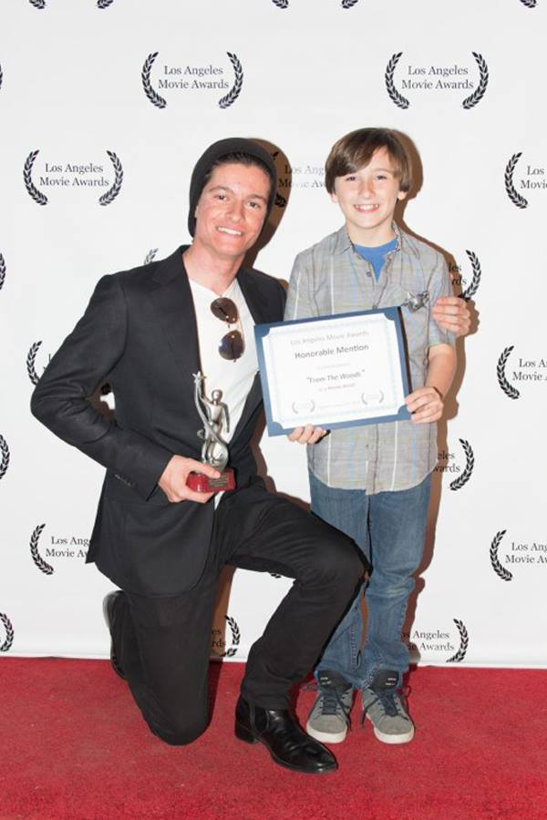 Nicolas Wendl Dir. of From The Woods and Cameron McIntyre, Aaron Mayfair of From The Woods at the Los Angeles Movie Award. From the Wood received Honorable Mention and Best Score.