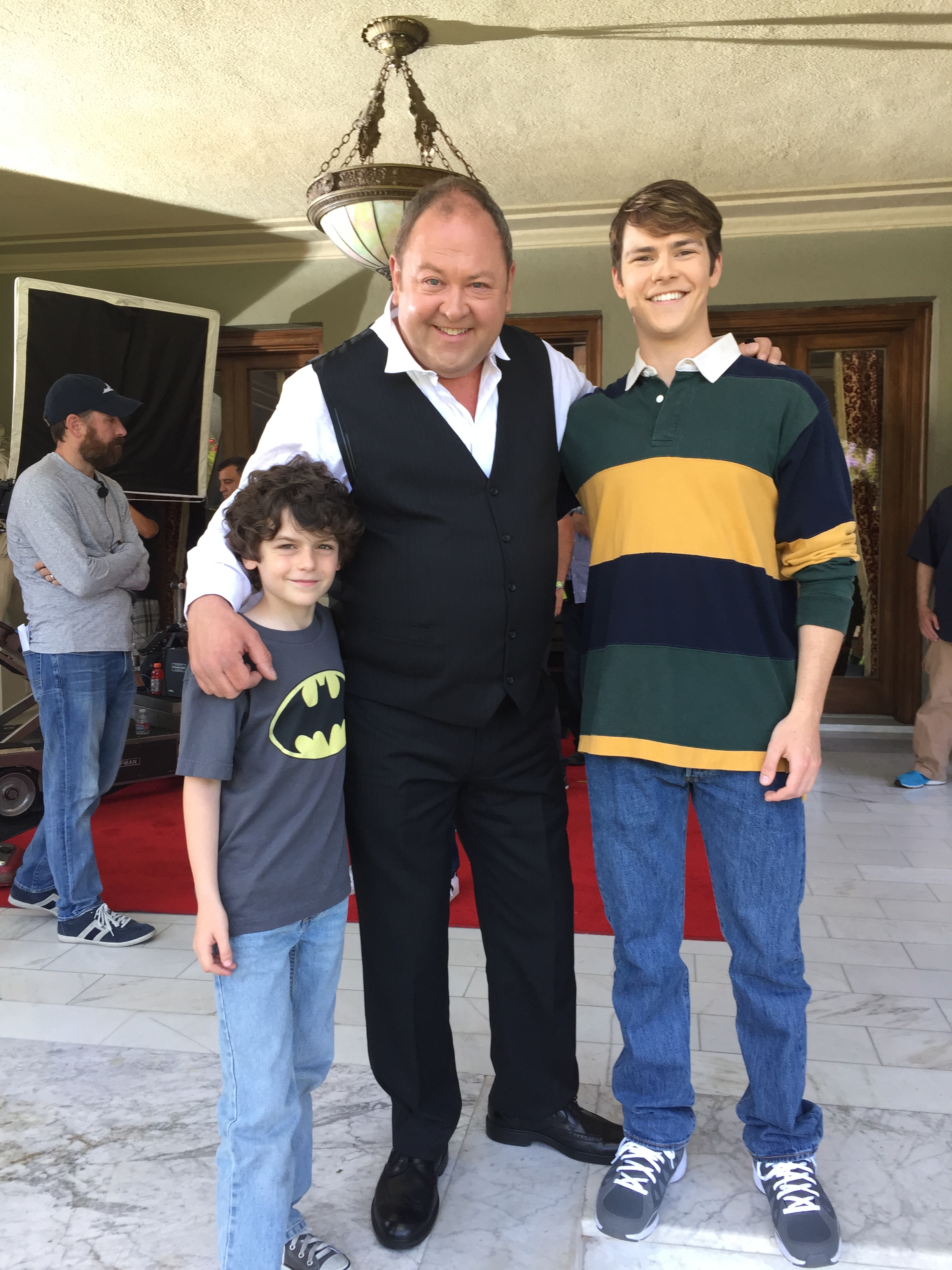 Garrett on set with Zachary Rifkin (left), and Mark Addy (middle)