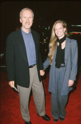 James Cameron and Suzy Amis at event of End of Days (1999)