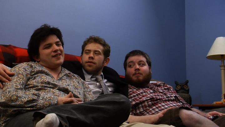 Still from Gentlemen's Dwelling, stars Zach Stasz, Ben Leasure and Joe Lankheet (L to R) figure out who will get to date 'Sherry' in episode 2, 