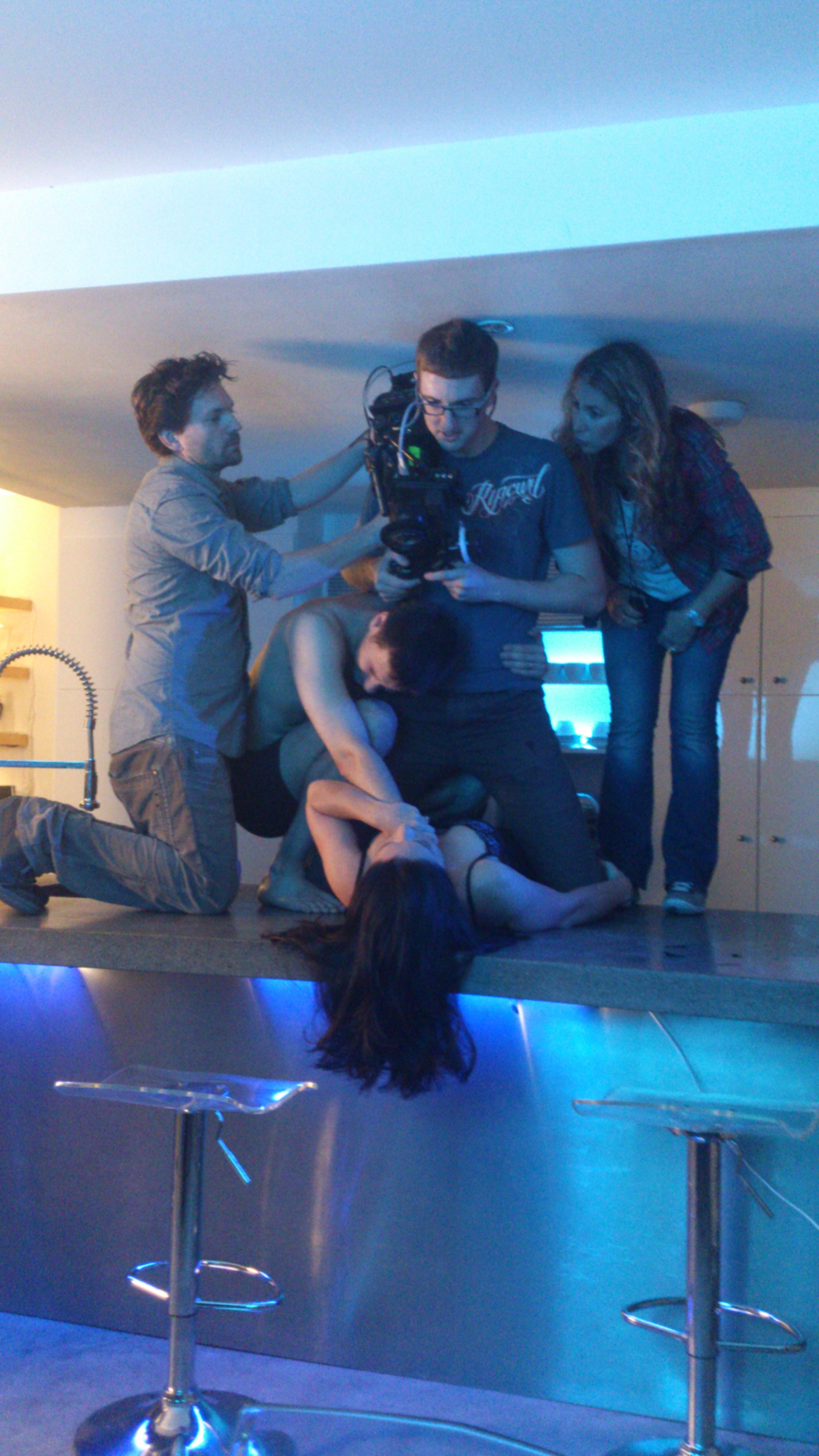 Michael Spry straddling Miranda Magee and being hugged by Christopher Slater on the set of Marriage. Flanked by the Director Katerina Philippou and Cinematographer Paul Curtis.