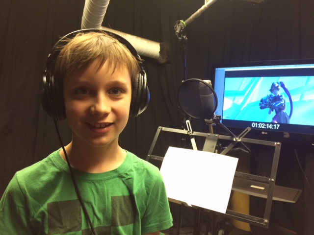 Working in the voice over booth doing ADR.