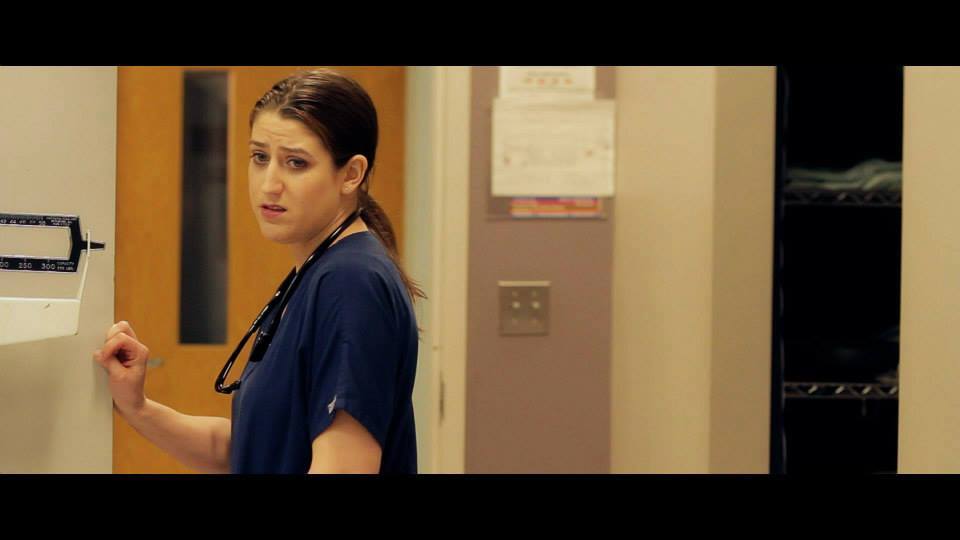 Kelli-Anne Harris as Nurse Boyle in 