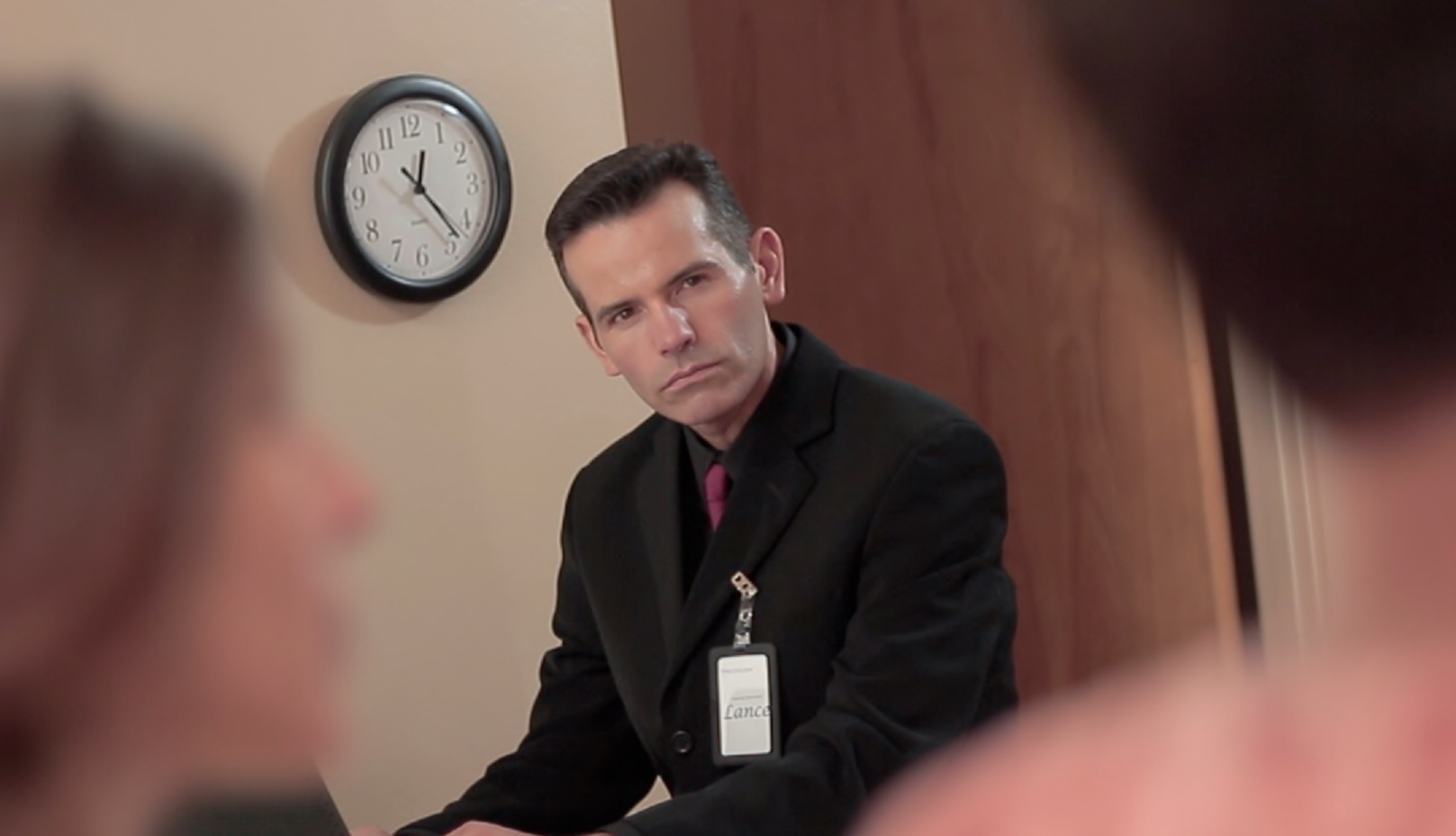 Lance Charnow as THE OMINOUS REAL ESTATE AGENT in a scene from 