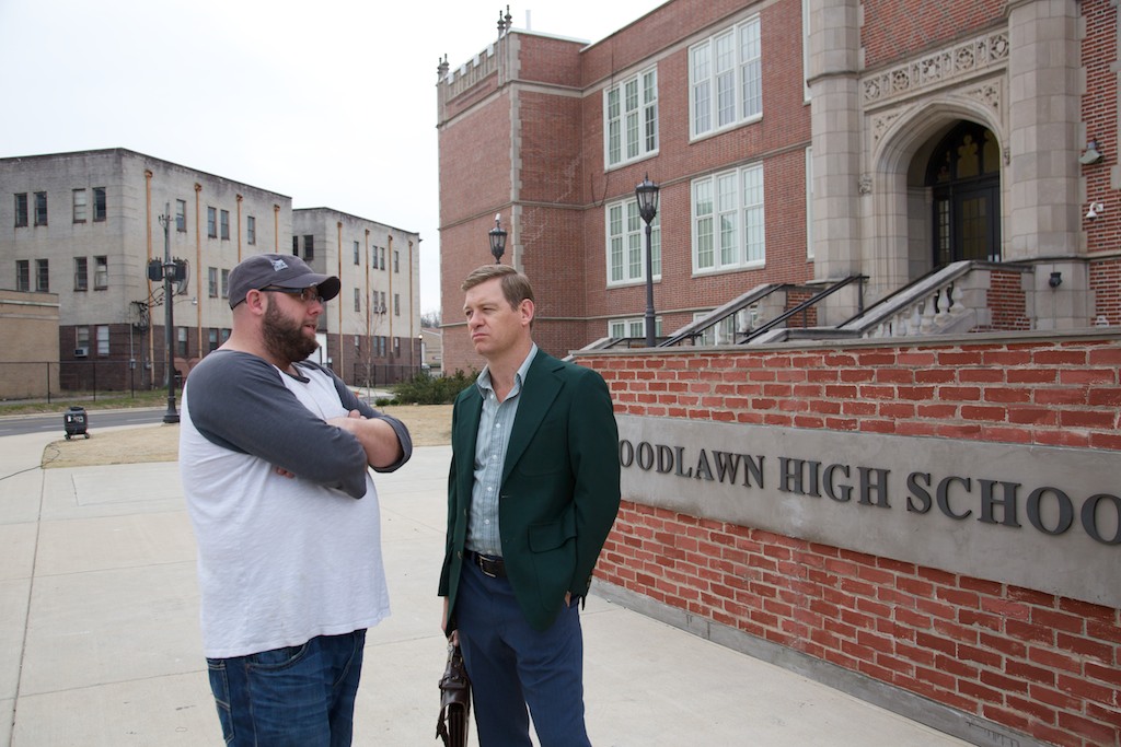 Andrew Erwin on the set of Woodlawn with actor Nic Bishop.